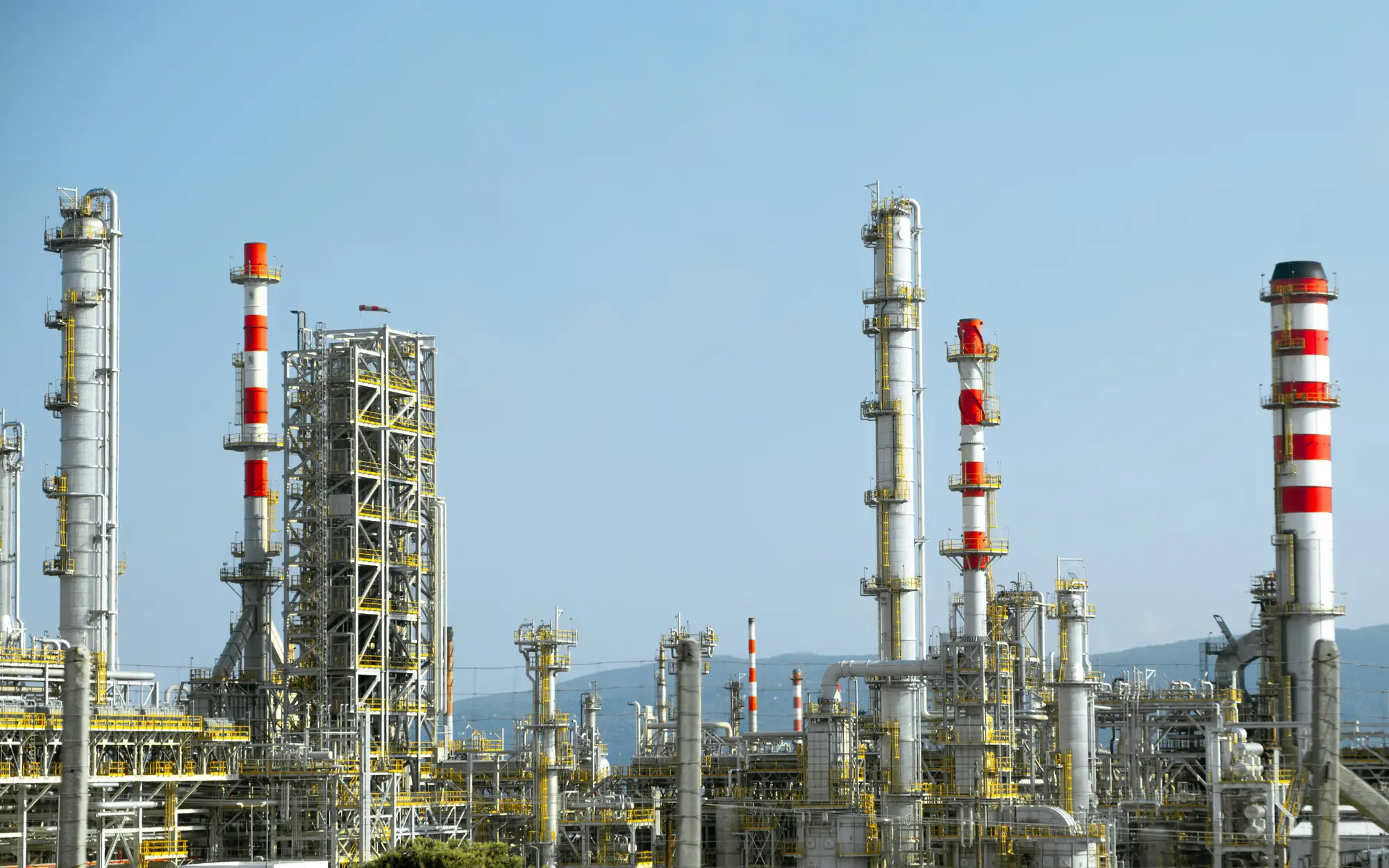 Refinery towers against the sky